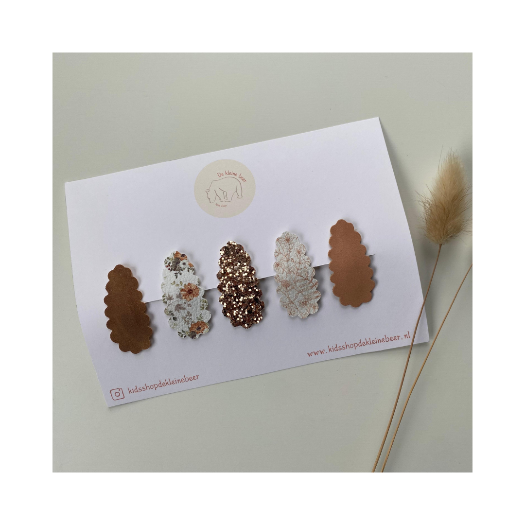 Brown click-clack hair clips